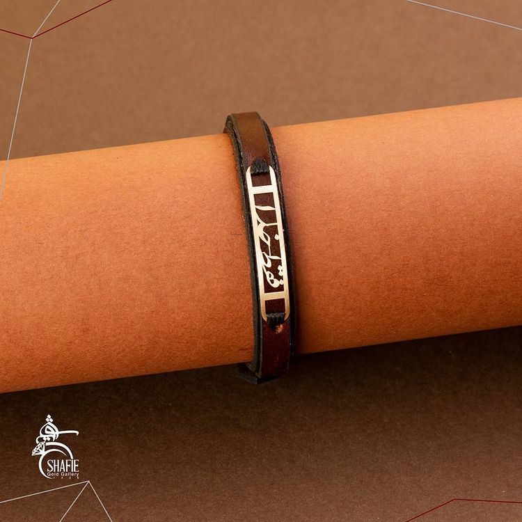 دستبند چرم و طلا .jpg